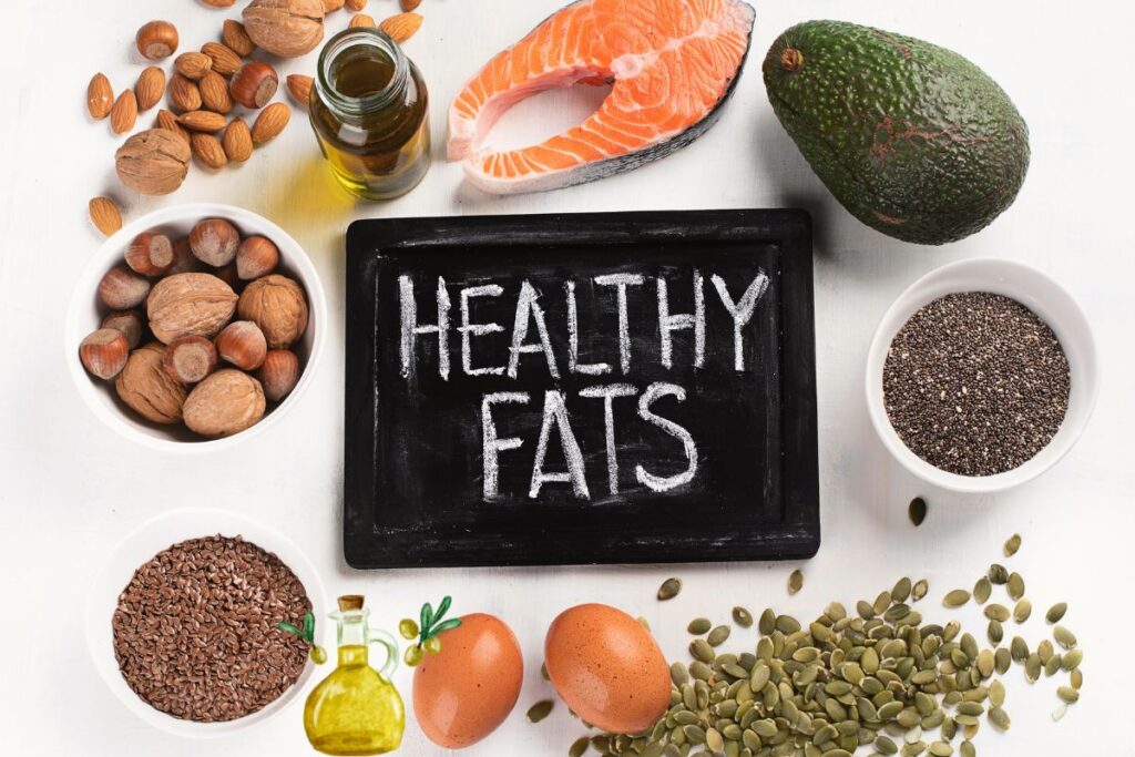 Sources of healthy fats: almonds, walnuts, olive oil, salmon, avocado, chia seeds, flaxseeds, eggs, and pumpkin seeds.